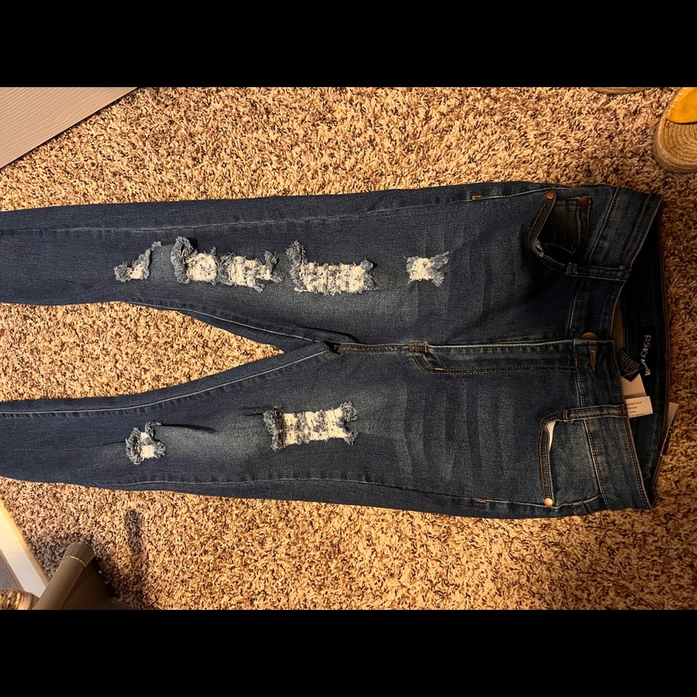 High waisted distressed jeans